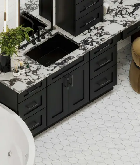 Black bathroom vanity with a black-and-white veined stone top
